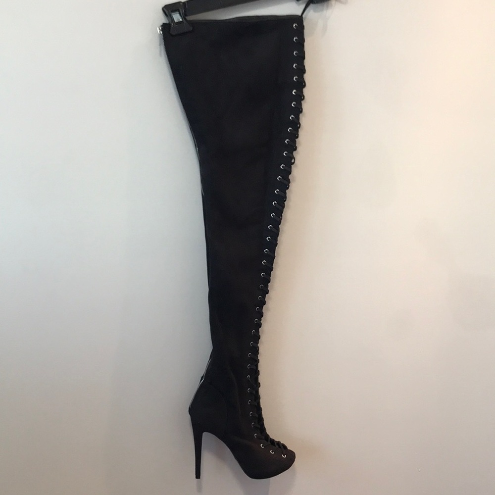Bebe 32” thigh high lace up boots. Size 8. Brand new.